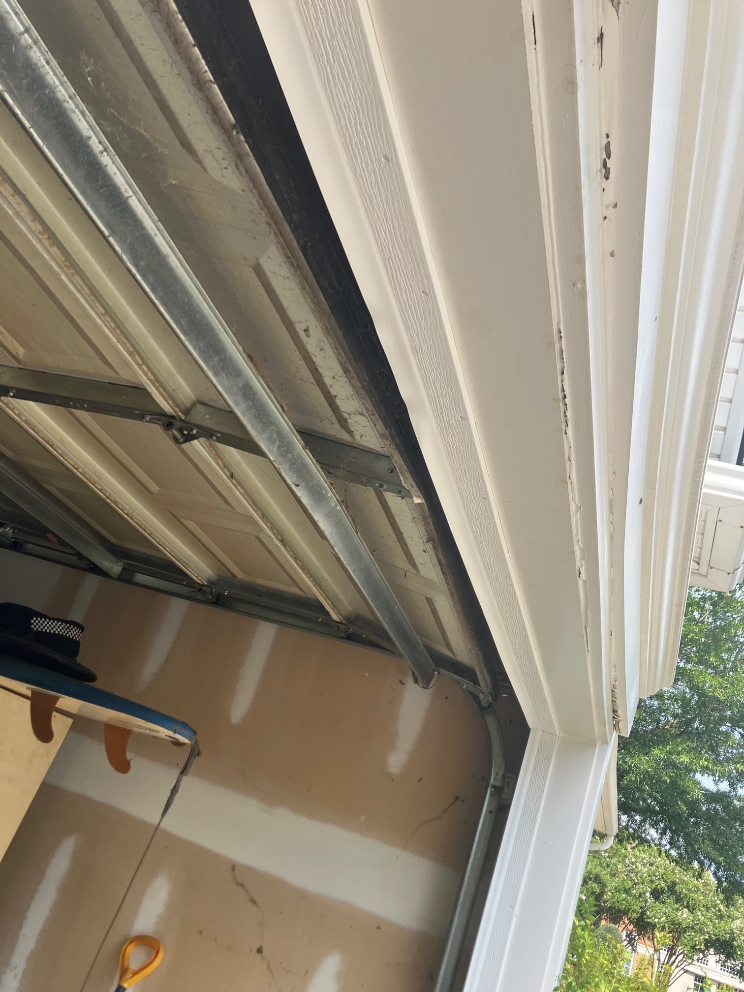 Deteriorated header frame trim and top panel seal